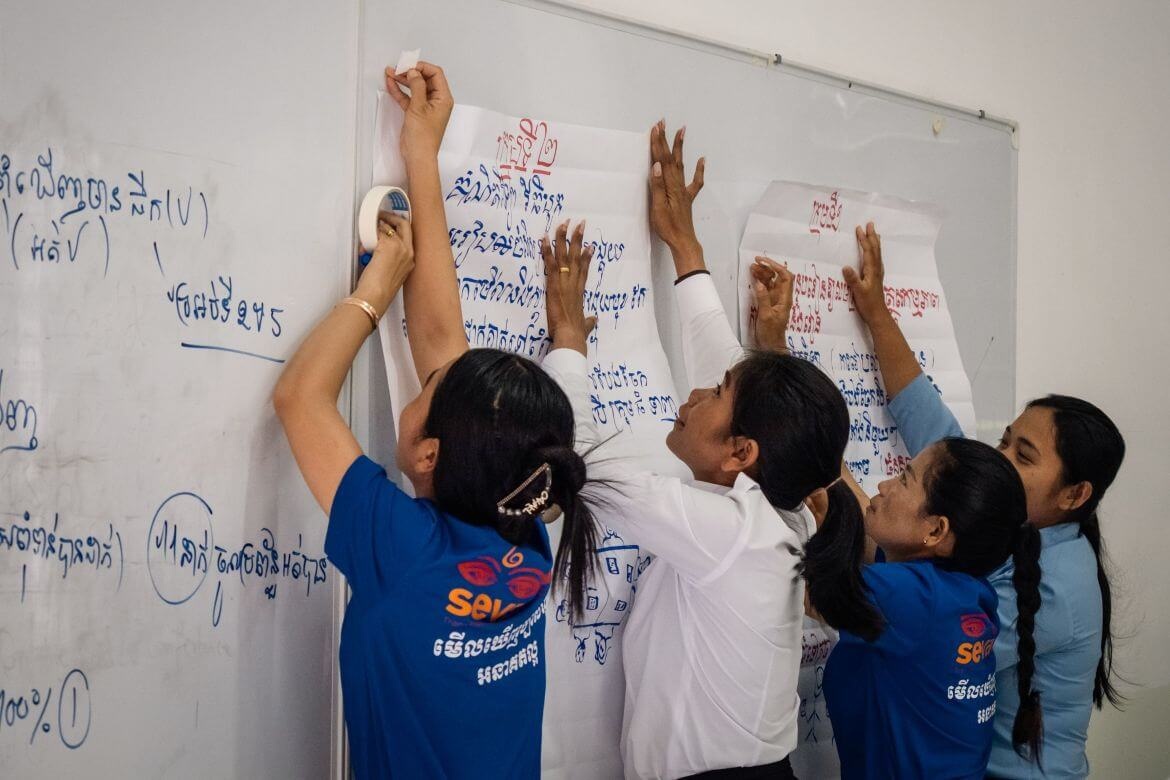 Teachers discuss and share their practices on classroom management during continuous professional development training. Credit: UNESCO/Yuan Xu