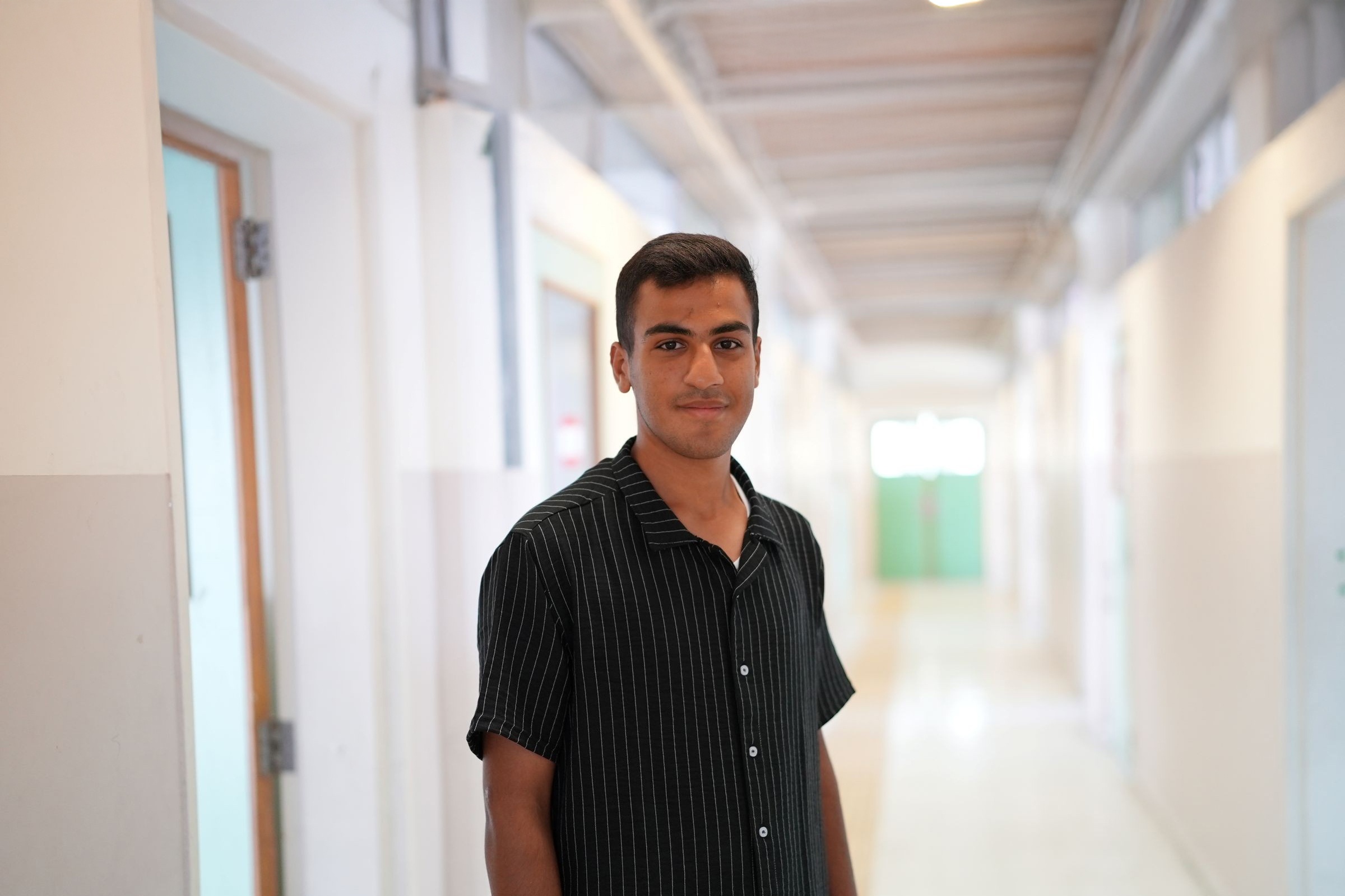 For 18-year-old Qasim, school is more than classrooms and books—it’s a lifeline.