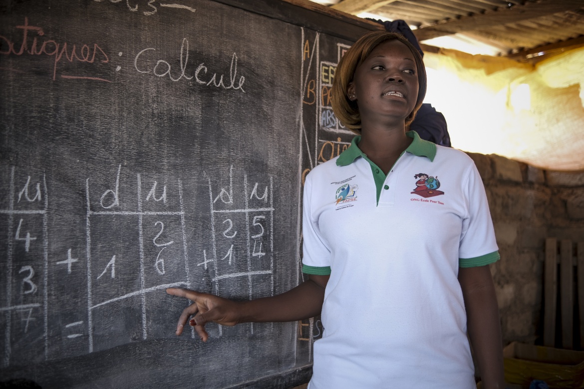 Teacher in bridge classroom at Trypoungo